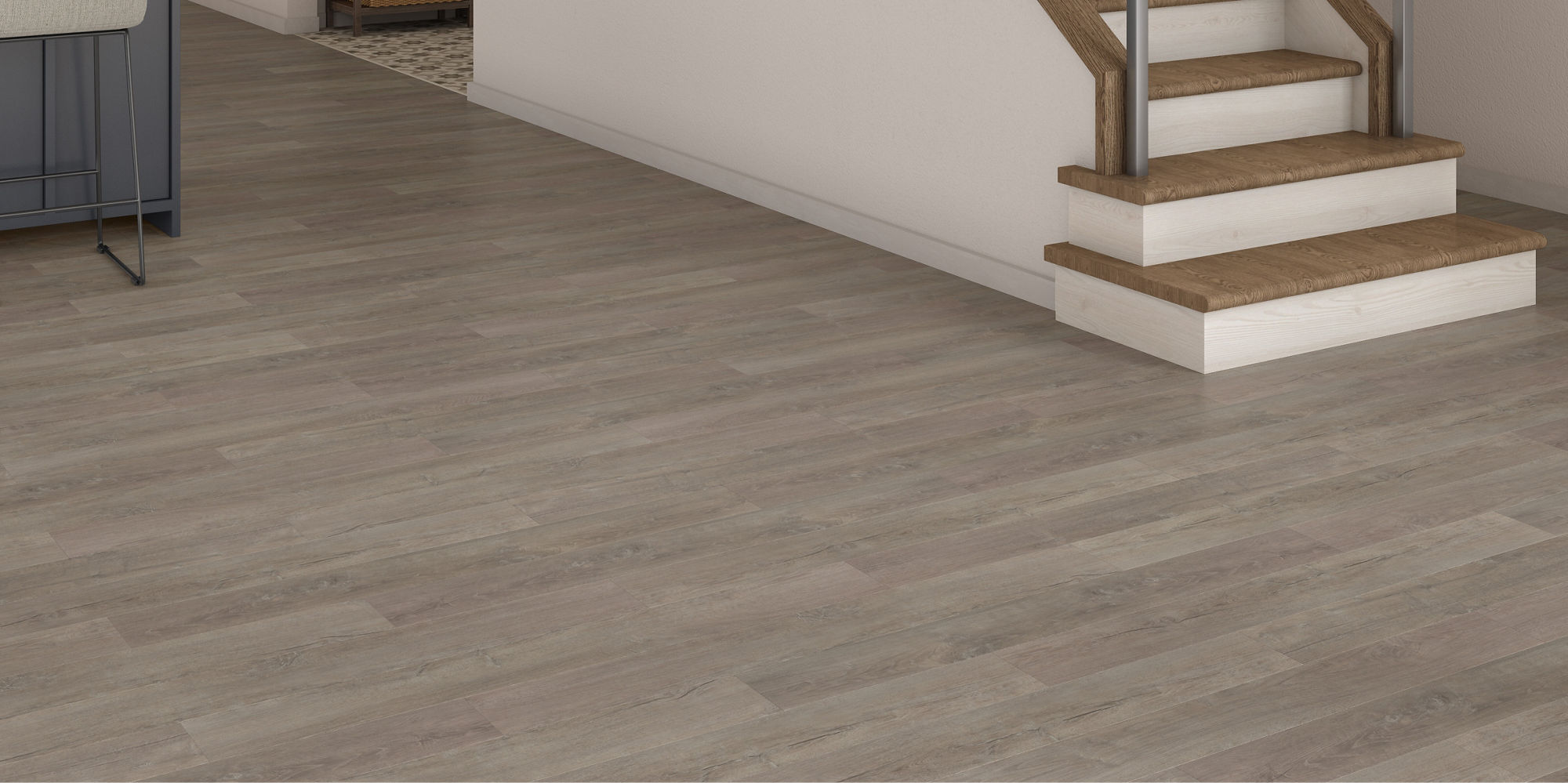 Living space with light gray wood look floor tile, white walls, and staircase,.