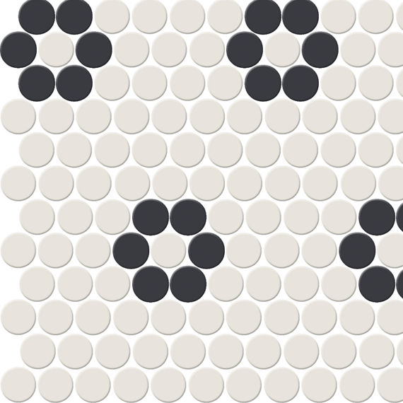 A repeating pattern of black and white circular tiles forming floral shapes