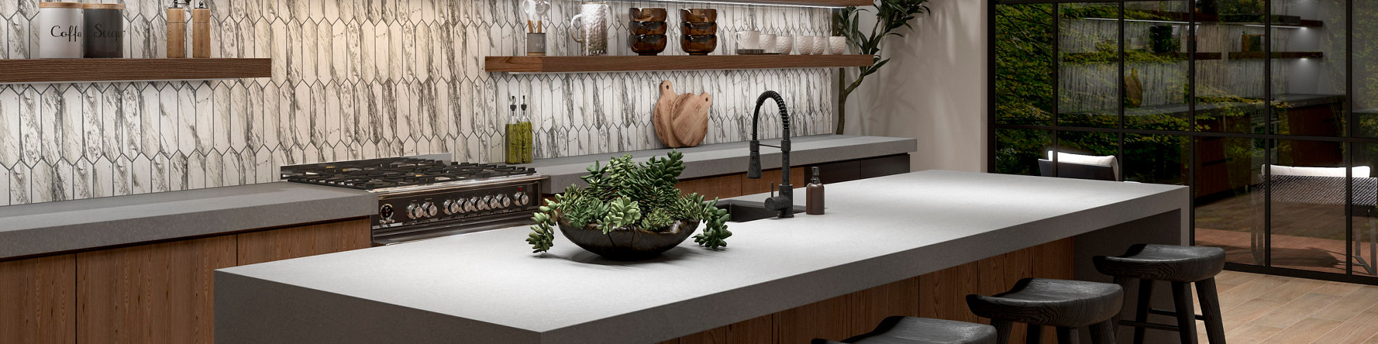 Open concept kitchen with gray countertops and marble picket backsplash. 