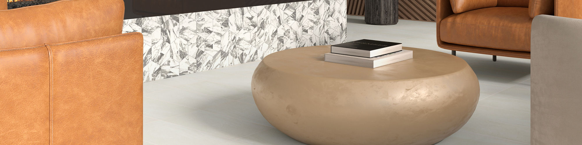 A contemporary lounge features a striking linear fireplace set in a wall with geometric patterned tiles. The space is furnished with tan leather armchairs, a round beige coffee table, and a modern chandelier with exposed bulbs. Wooden accent walls an