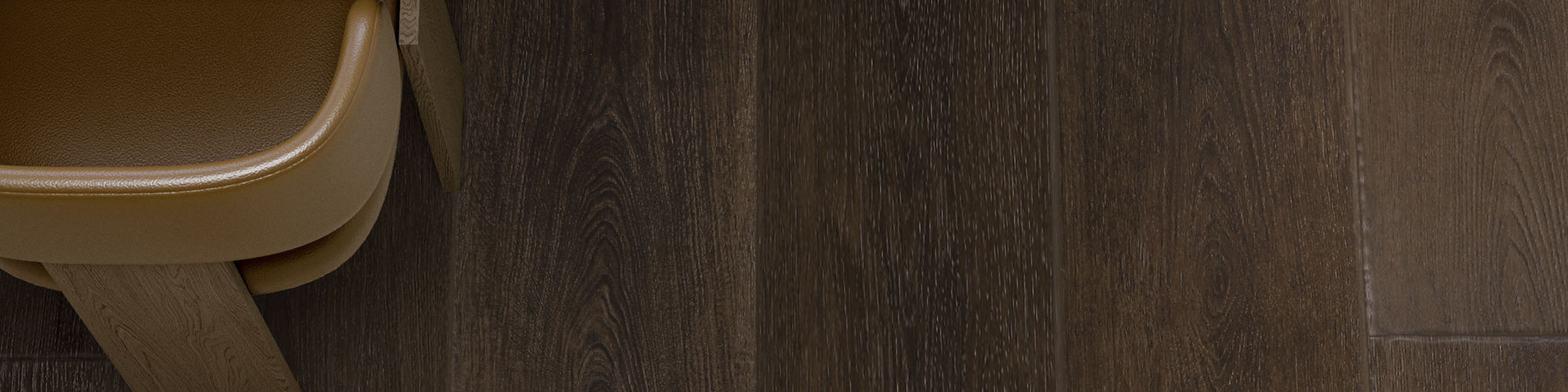 A rustic wooden dining table is partially visible, featuring a ceramic plate with several green pears. 