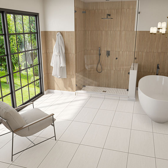 Bathroom with white stone look floor tile, wood walls, and a white chair.