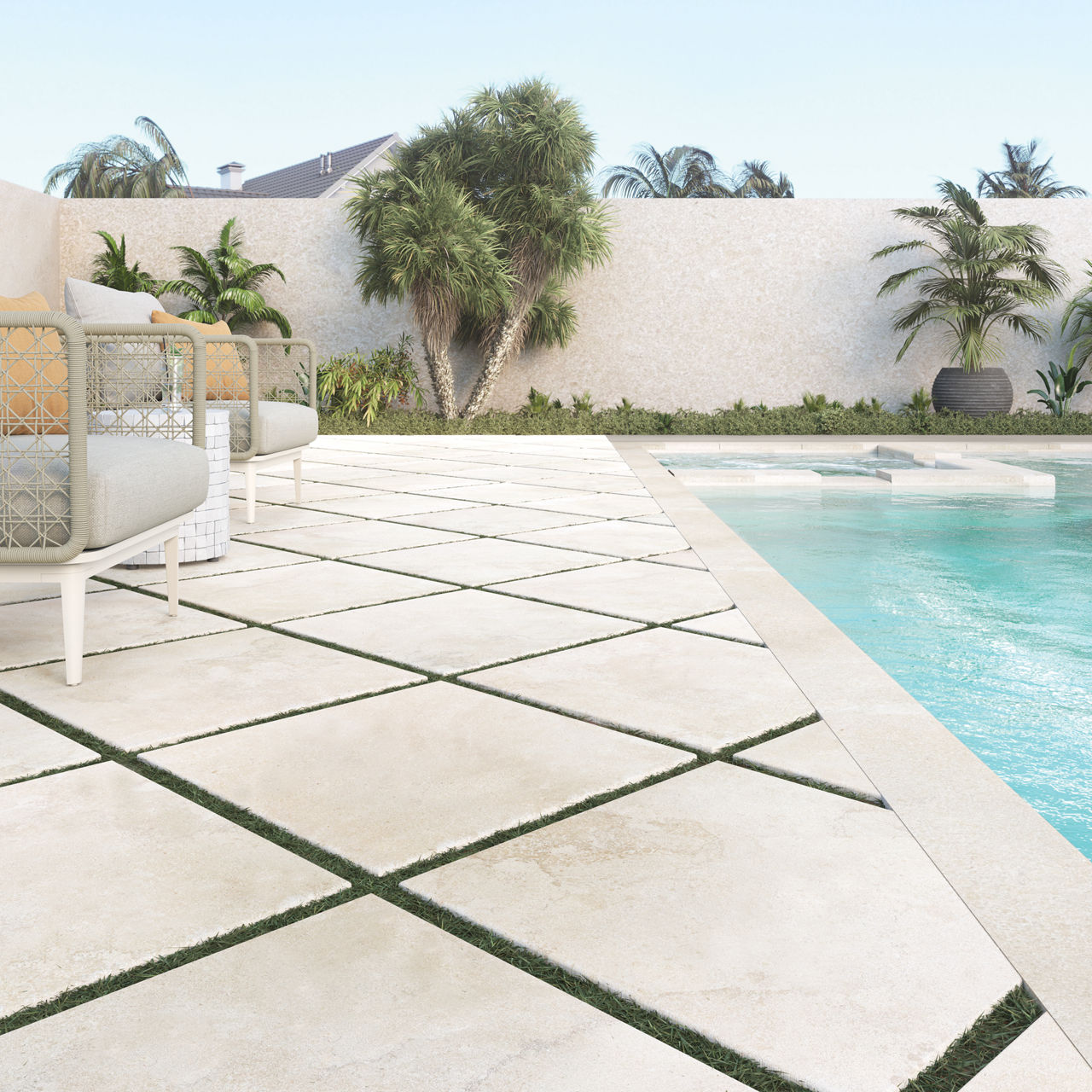 Pool side with white stone look pavers.