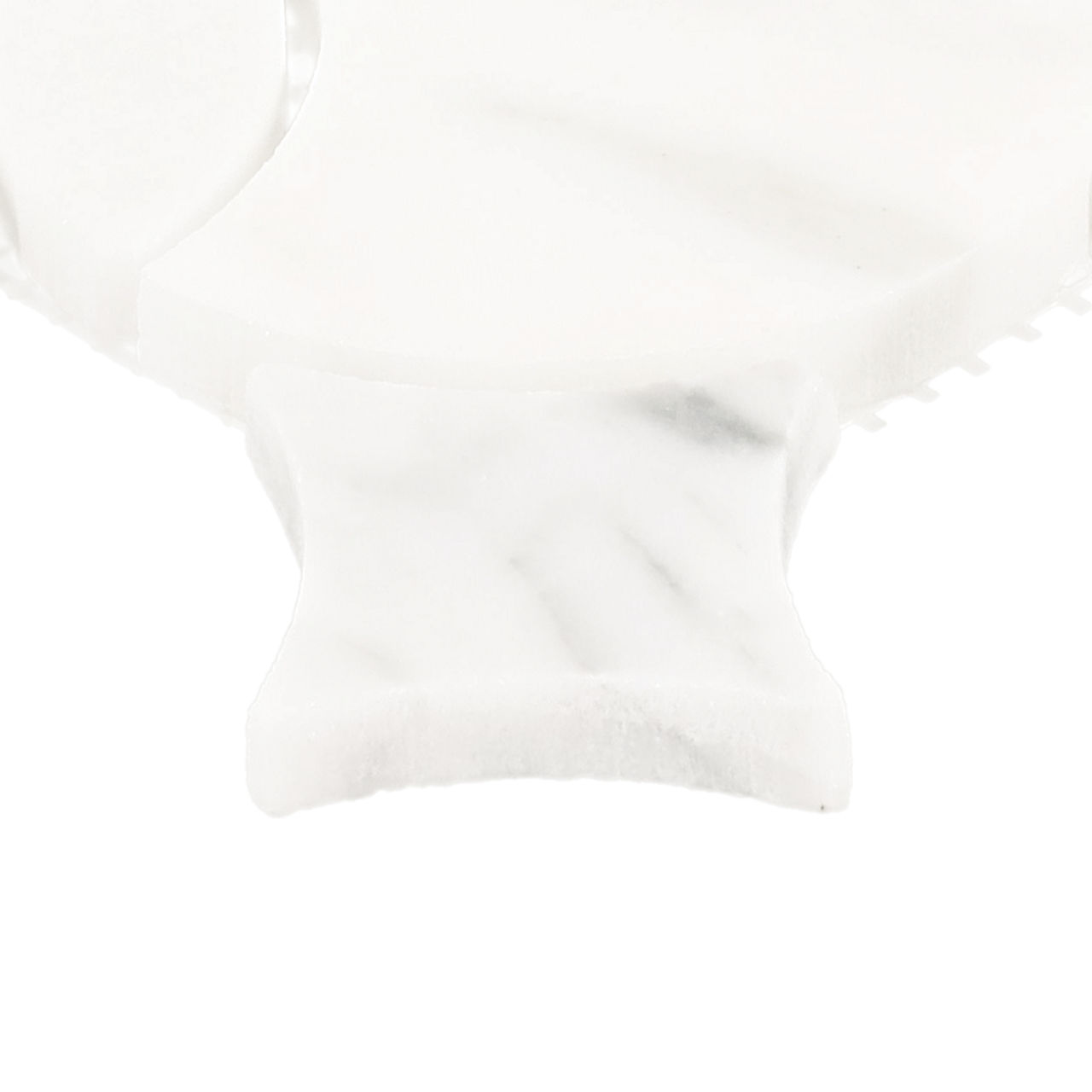 Close-up view of a white marble serving board against a bright white background. The image focuses on the handle area, showing subtle gray veining in the stone. Edges of the board are softly rounded, giving a smooth, polished appearance. The minimal 