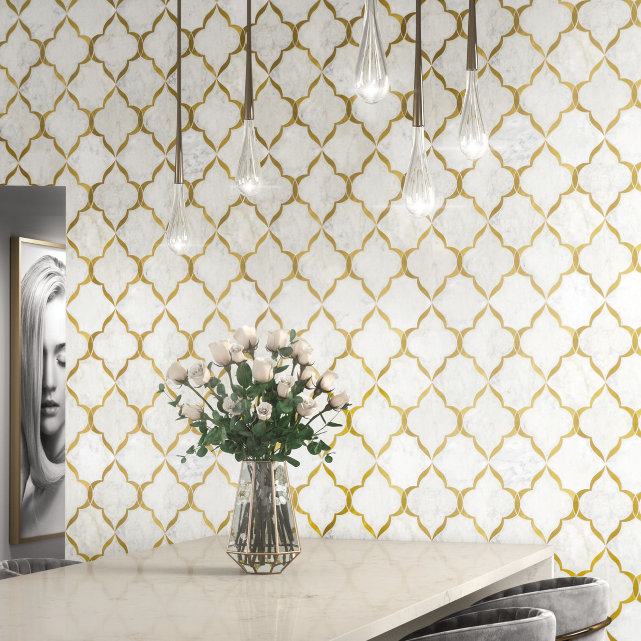 A contemporary kitchen features a striking gold and white geometric tile wall as its focal point. The space is accented by a marble countertop, a vase of white roses, and modern pendant lighting. A monochrome portrait adds an artistic touch to the se