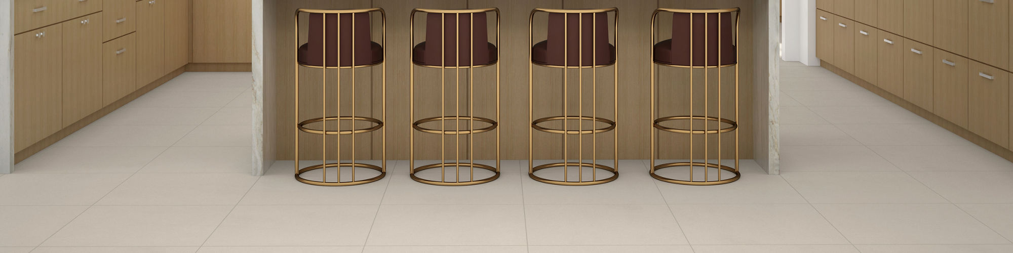 Kitchen with ivory white concrete look square floor tile, wood cabinets, white quartzite look backsplash, white walls, and gold accents.