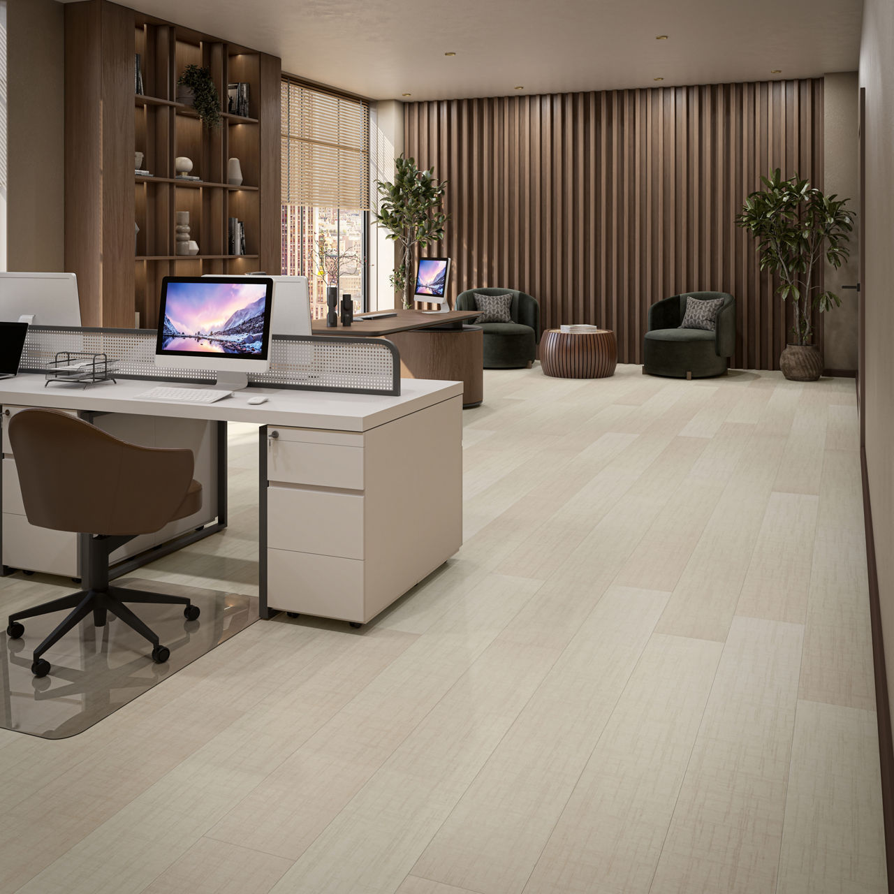 A contemporary office space features a large white desk with a computer monitor displaying a colorful screen.