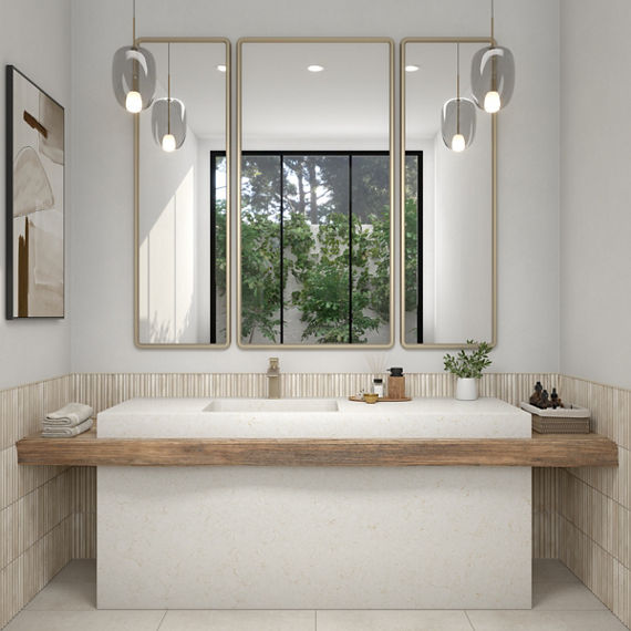 Bathroom with white stone look quartz counter, white floors and walls, and wooden accents.