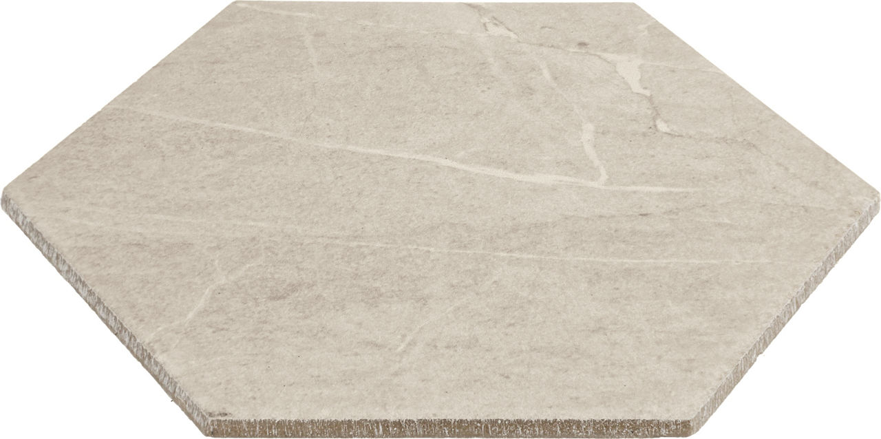 A single hexagonal tile is displayed against a white background. The tile features a beige stone-like surface with subtle natural veining patterns. Its edges are cleanly cut, and the texture suggests a matte finish. No visible text, numbers, or logos
