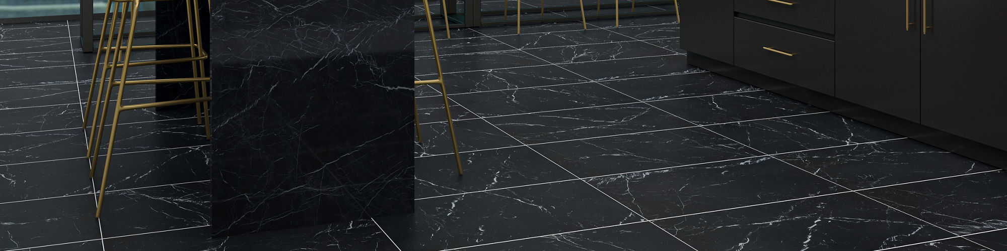 Sports stadium lounge with black marble look counter, rectangle floor tile, and back wall, black cabinets, and beige chairs.