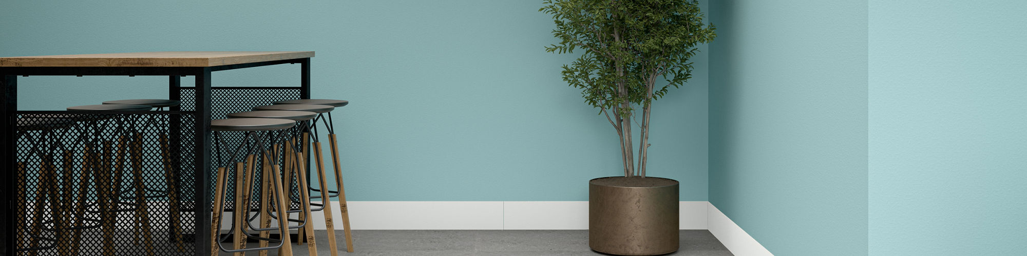 A contemporary interior space features a light gray floor and a two-tone wall with a blue accent and white upper section.