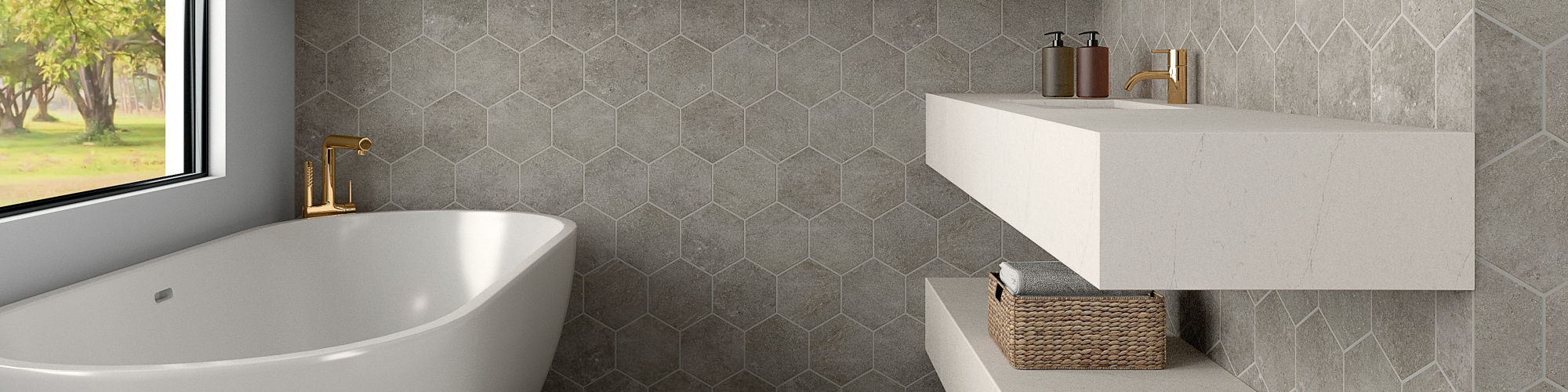 Bathroom with white countertop, white bathtub, gray hexagon concrete look tile on walls, gray concrete look rectangle tile on floor, and wooden accents.