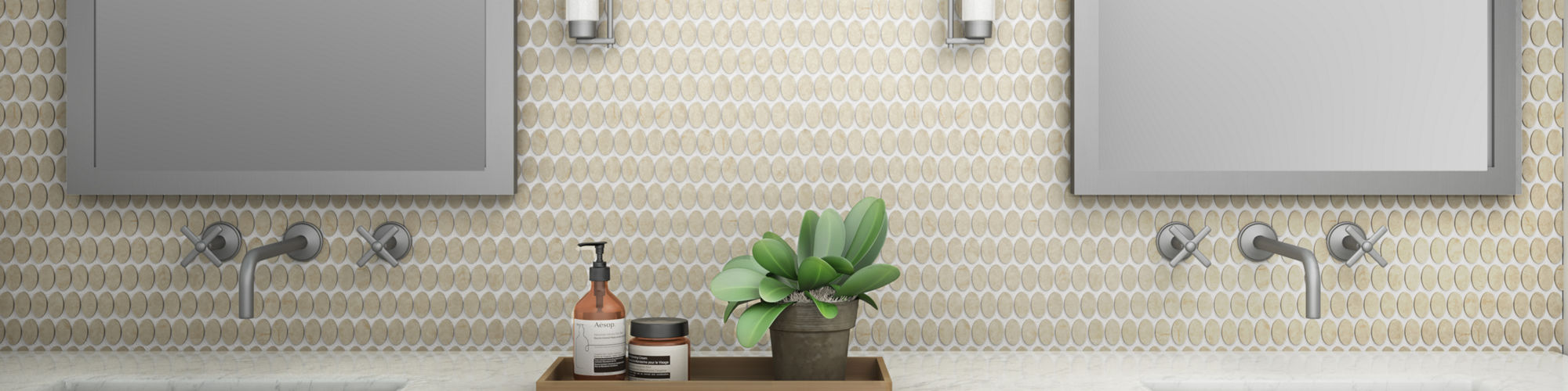Bathroom with beige oval mosaic on back wall, white countertop, double sinks with rectangle mirrors above each, and soap in center of counter.