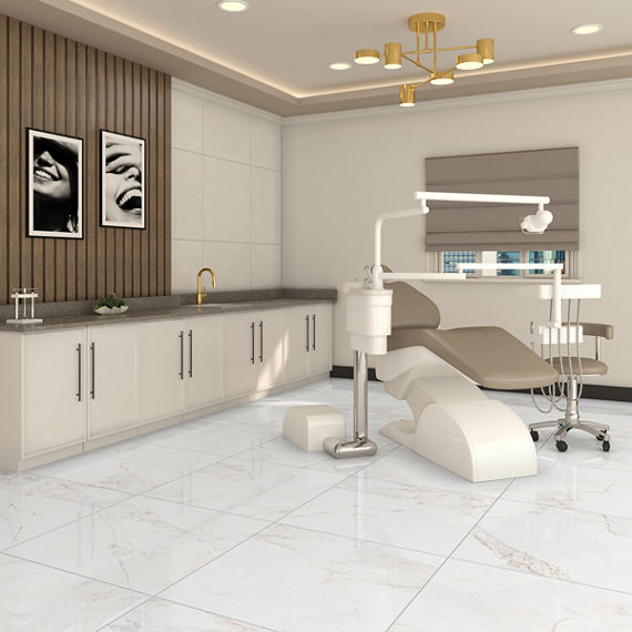 Dental office chair with white marble look square floor tile, white cabinets, and a beige dental chair.