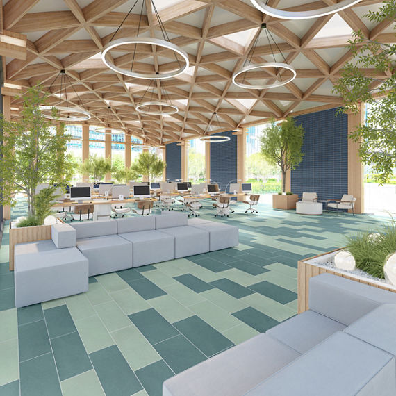 Library with large windows, light wood accents, light blue and blue rectangle concrete look floor tile, gray couches, blue walls, and small trees throughout the room.