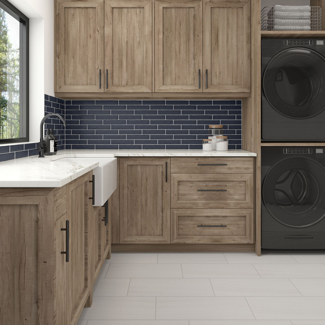 Kitchen with blue rectangle subway tile in offset patter, white countertop, light wood cabinets, and white rectangle floor tile.
