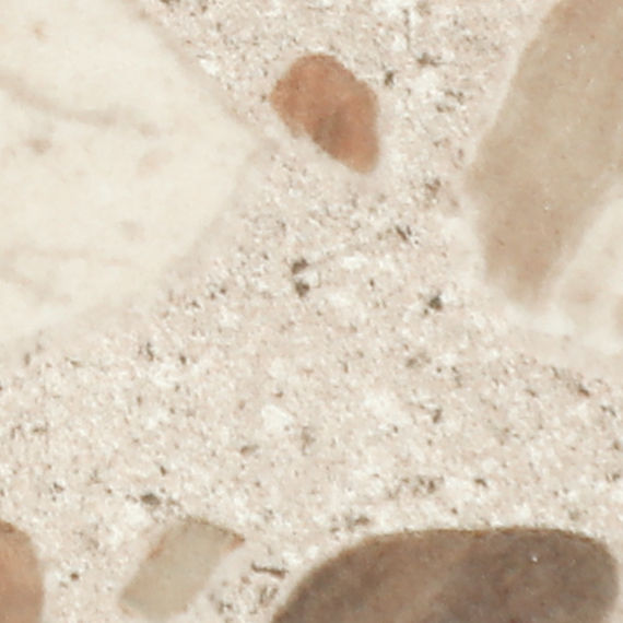 A square mosaic tile pattern features a terrazzo design with beige and brown stone fragments embedded in a light background. The tiles are separated by thin, visible grout lines, creating a grid effect. The overall palette is neutral, with natural st