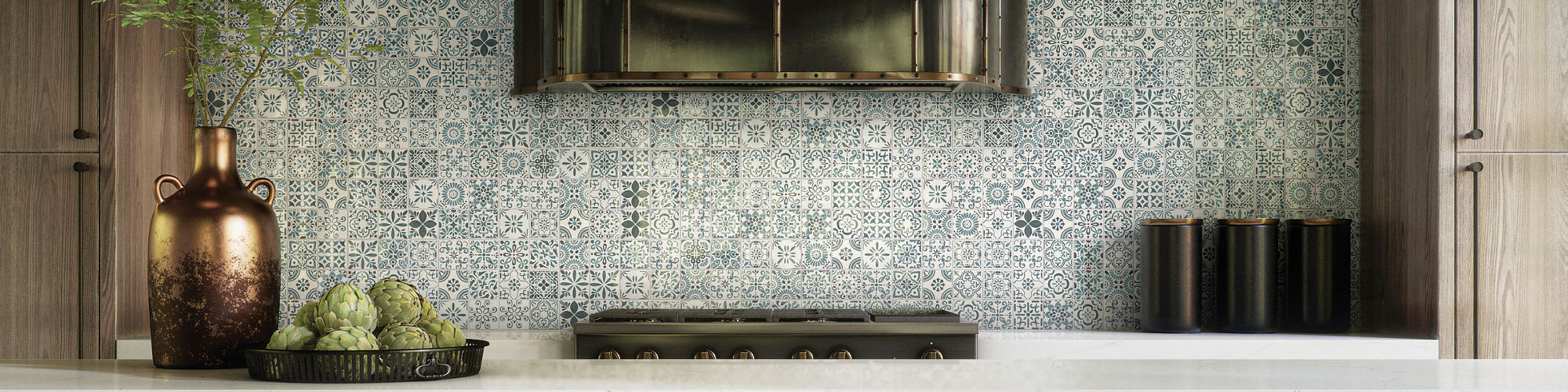 Bar with encaustic square tile on back wall, gray square floor tile, wooden cabinets, and white bar chairs.