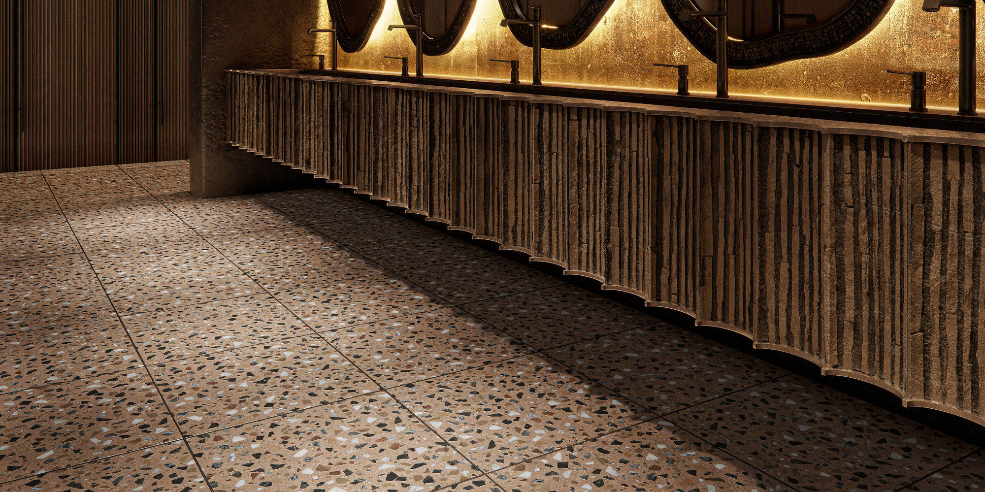 Bathroom with wood accents, five sinks and mirrors, and an orange terrazzo look square floor tile.
