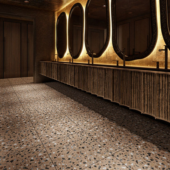 Bathroom with wood accents, five sinks and mirrors, and an orange terrazzo look square floor tile.
