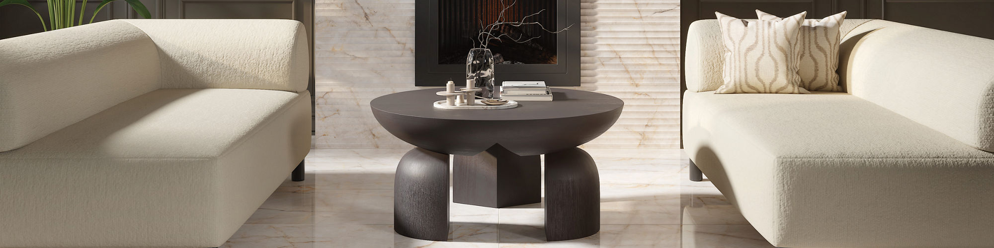 A contemporary living room features two cream-colored minimalist sofas facing a low round coffee table. The space is anchored by glossy marble-look flooring and a marble accent wall surrounding a sleek recessed fireplace. Dark paneled walls with vert