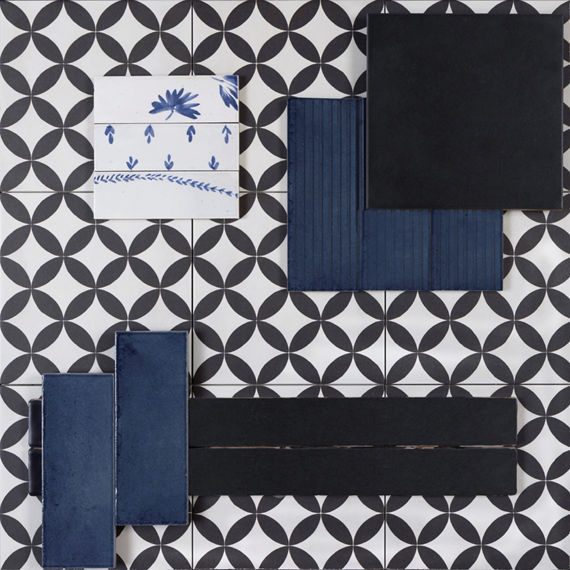 This flaltay contains encaustic tile accented with raked glass look tile, concrete look tile, undulated tile, and straight joint encaustic accent tile.