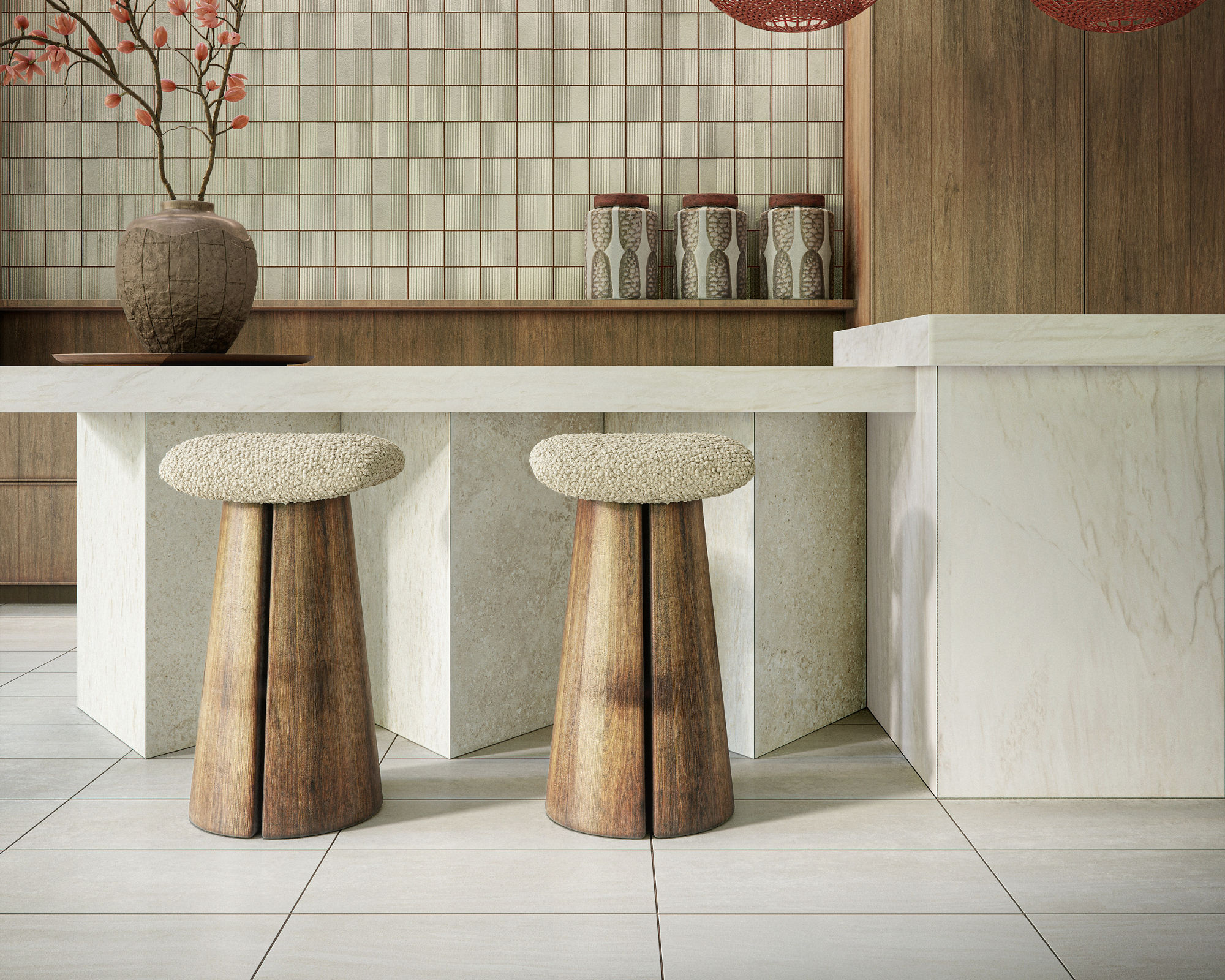 Kitchen with white square tiles on back wall, white stone table, two wood stools, and white square floor tile.