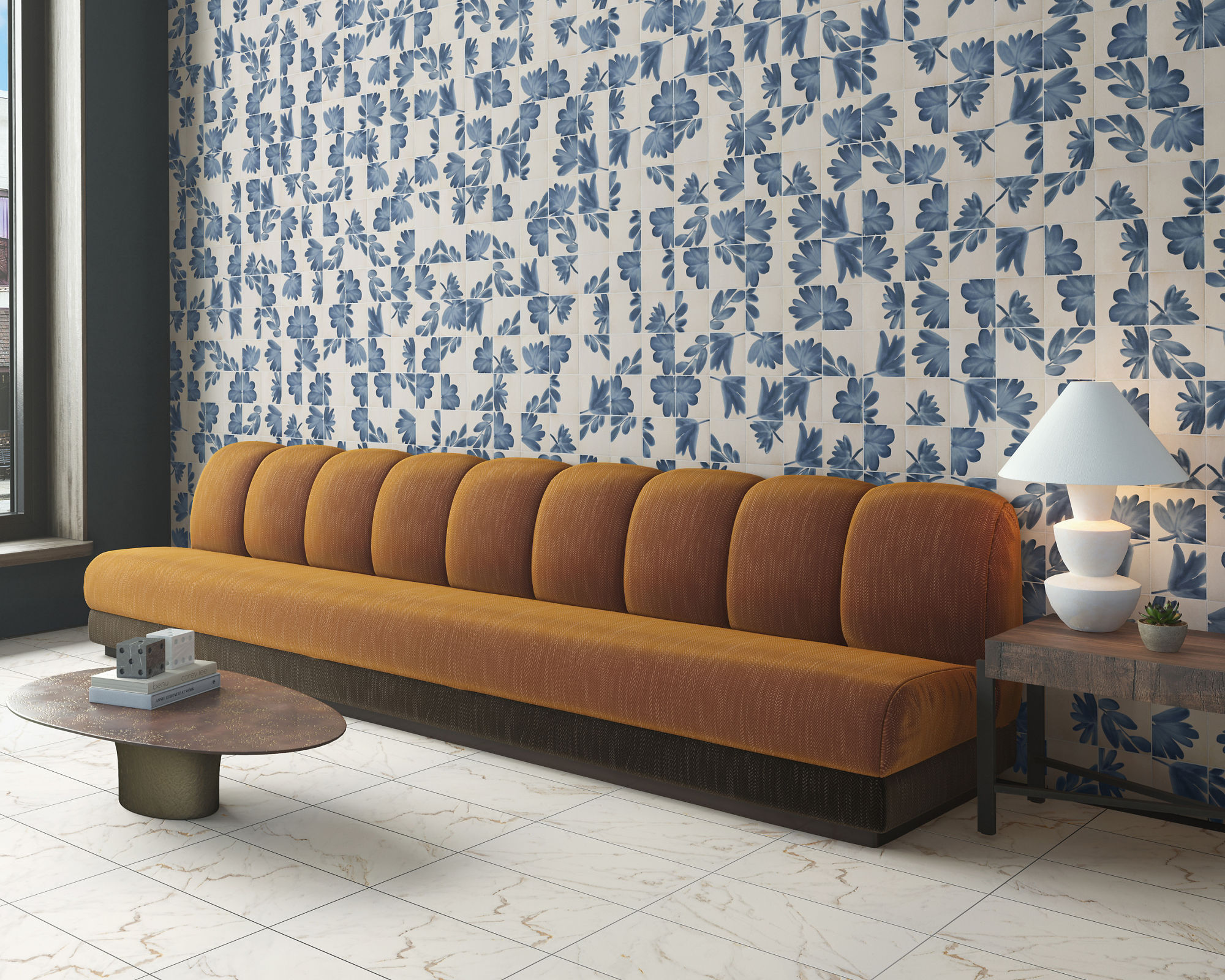 Yellow couch with white encaustic concrete look tile on back wall, white marble look rectangle floor tile, and wood accents.