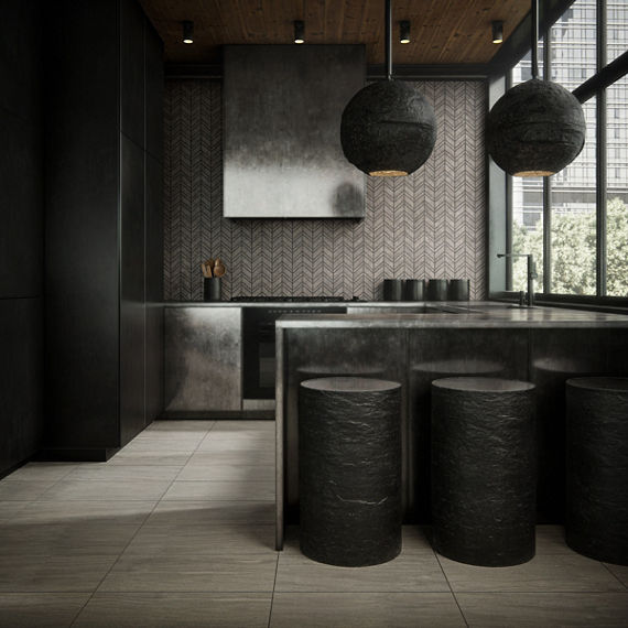 Kitchen with large square gray stone look floor tile, black tall cabinets, silver counters, and black accents.