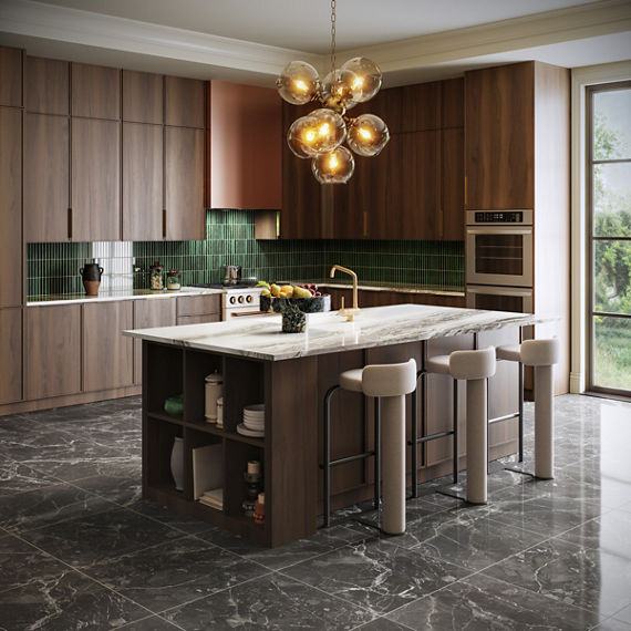 Kitchen with black marble look square floor tile, green fluted tile on backsplash, wood cabinets, and white countertops.