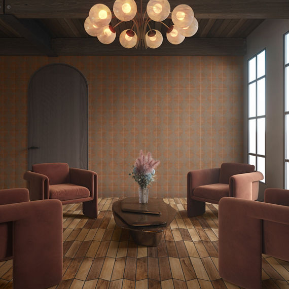Living area with 4 brown chairs, wood look chevron floor tile, and orange encaustic tile on back wall.