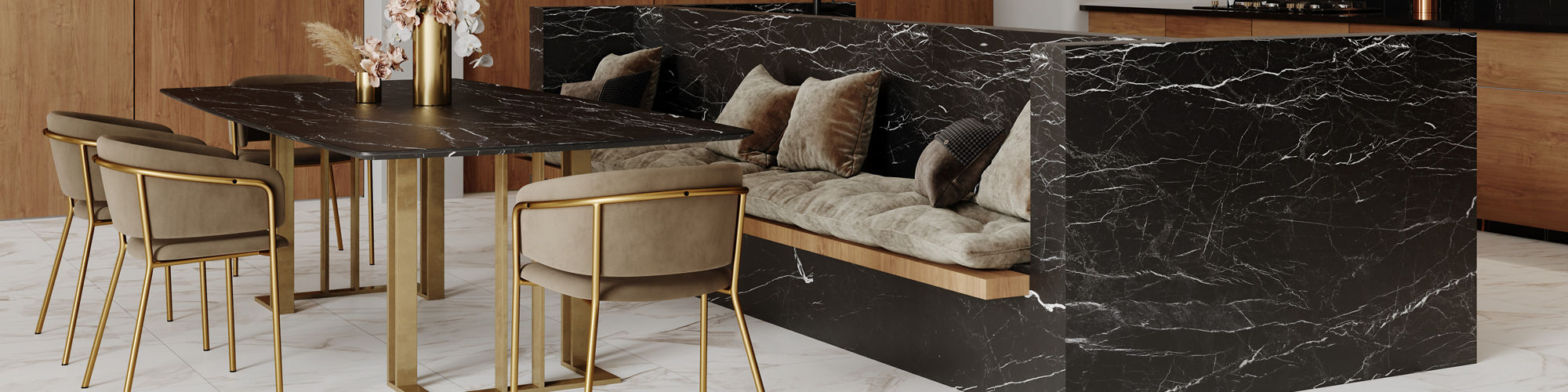 A contemporary open-plan kitchen and dining space features a striking black marble island with integrated seating. 