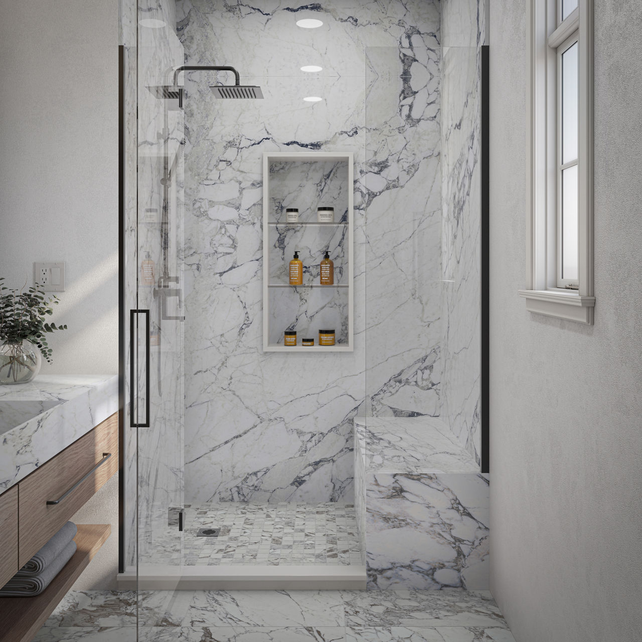 A contemporary bathroom features a spacious walk-in shower with striking white and gray marble walls and floor.