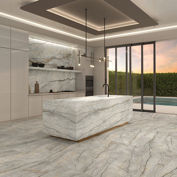 Kitchen with white marble look porcelain slab on floor, back wall, and center island.