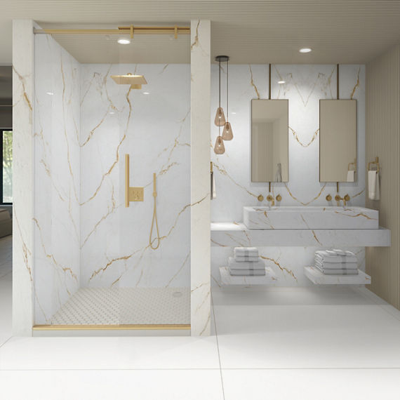 A luxurious bathroom features a spacious glass-enclosed shower with gold fixtures and marble walls. 
