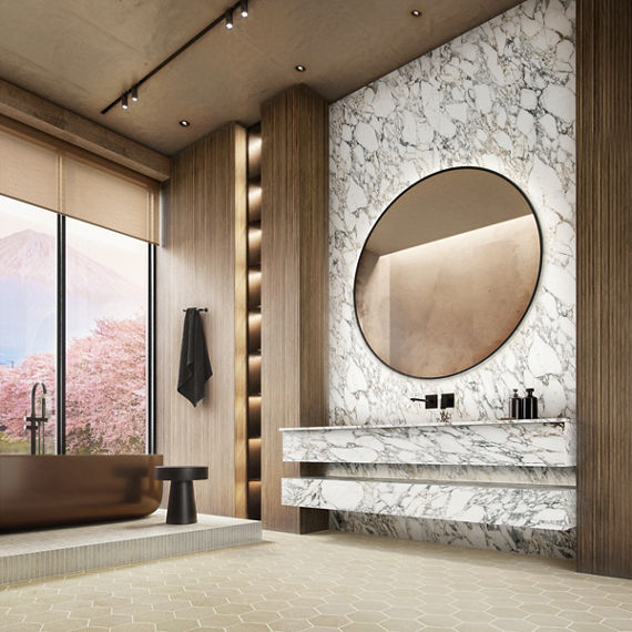 Bathroom with white marble look porcelain slab on back wall and counter, wood walls, and beige hexagon floor tile.