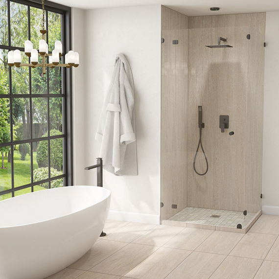 Bathroom with a glass?enclosed shower featuring a rainfall showerhead beside a freestanding tub, illuminated by natural light from large grid windows, with a white bathrobe on the wall, a modern chandelier, and beige tile flooring in a minimalist design.