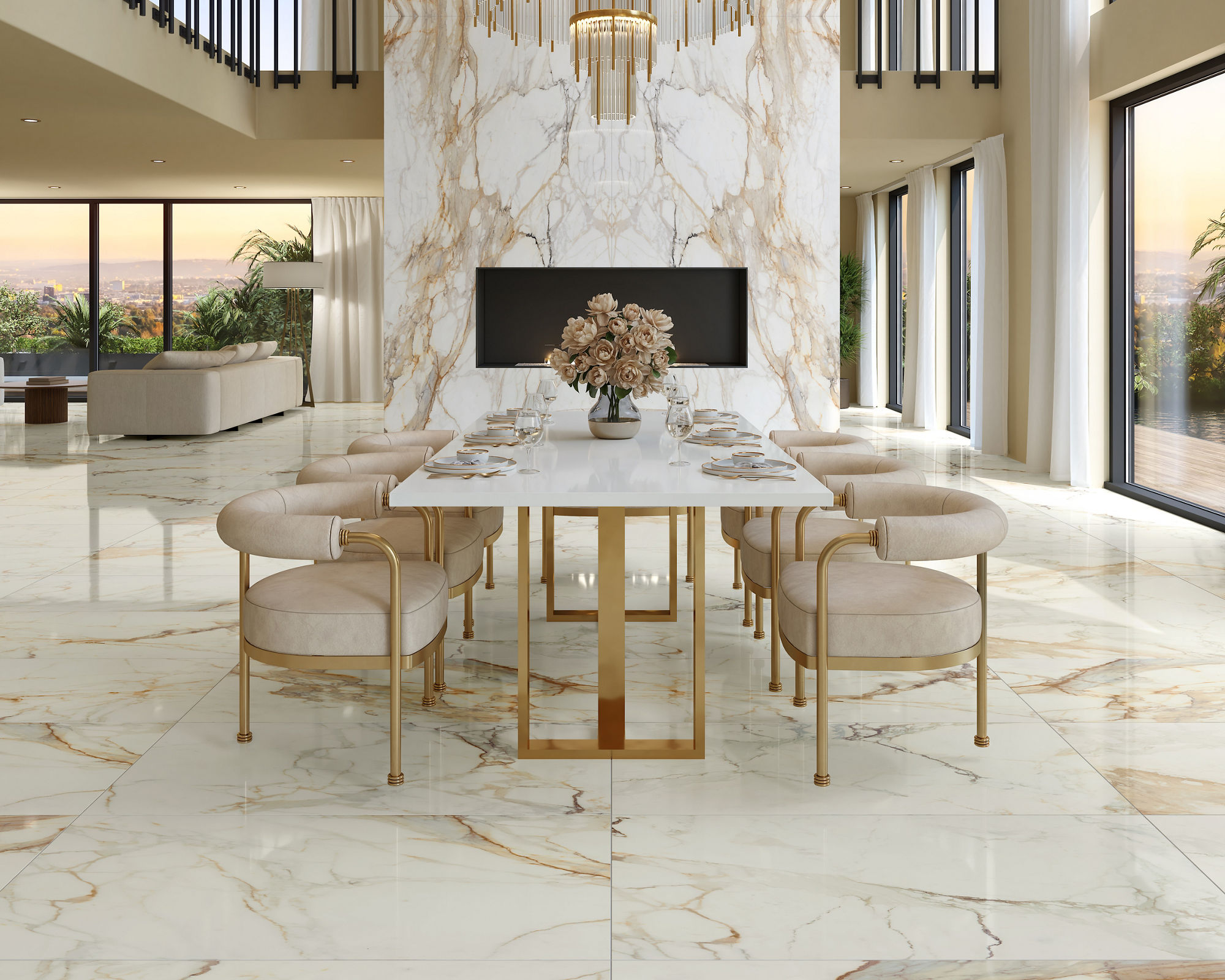 A spacious, double-height dining room features a long white table surrounded by upholstered chairs on a glossy marble floor. A dramatic marble-clad column and matching wall create a focal point, complemented by a large modern chandelier with cascadin