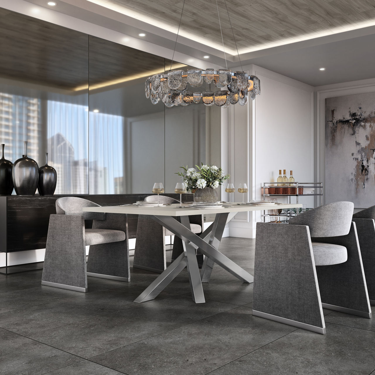 A contemporary dining room features a sleek glass-top table with angular gray chairs. A large crystal chandelier hangs above, casting reflections on the polished surfaces. The space includes a mirrored wall, dark sideboard with decorative vases, and 
