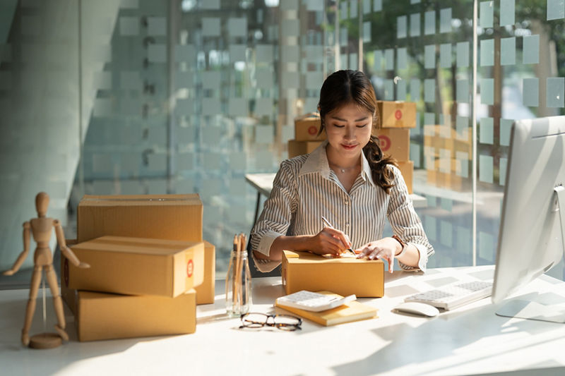 Start up small business entrepreneur SME or freelance man working at home concept,Online selling, e-commerce, Shipping concept,Online marketing packaging and delivery.
