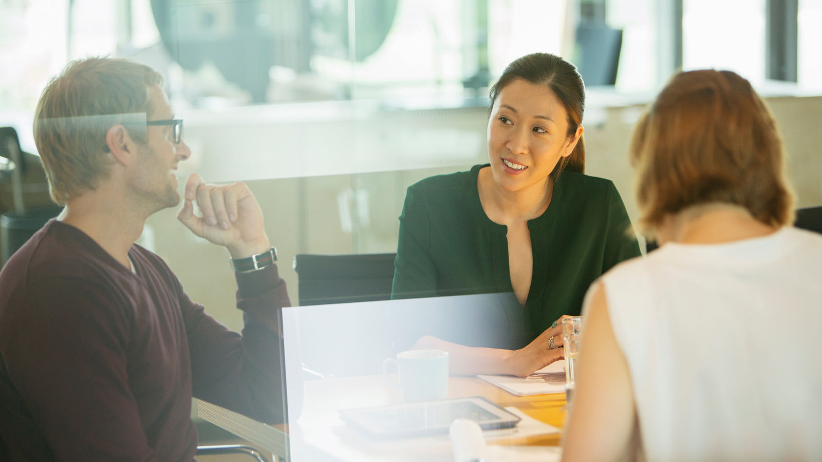 Business people talking in office meeting