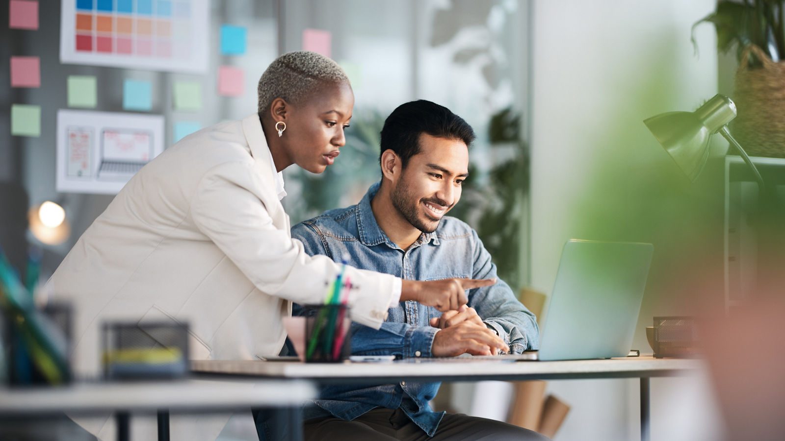 Office laptop, diversity teamwork and happy people review media application layout, creative design or research project. Collaboration, designer or professional team working on app development report.