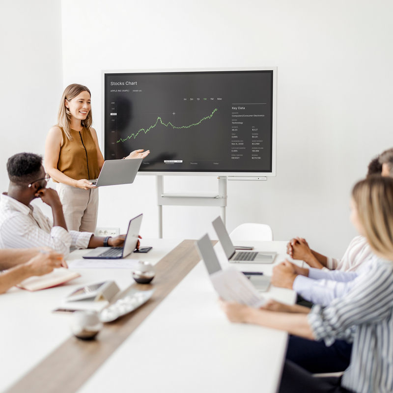 Woman presenting business data in meeting