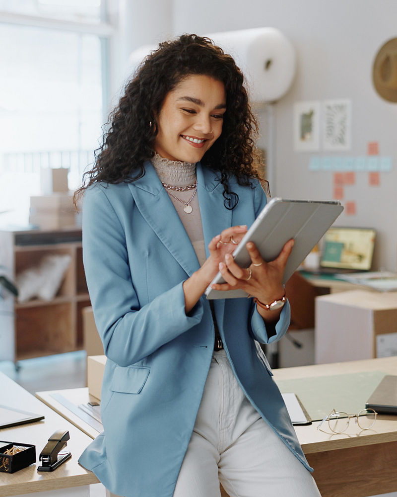 Woman, designer and tablet in small business 