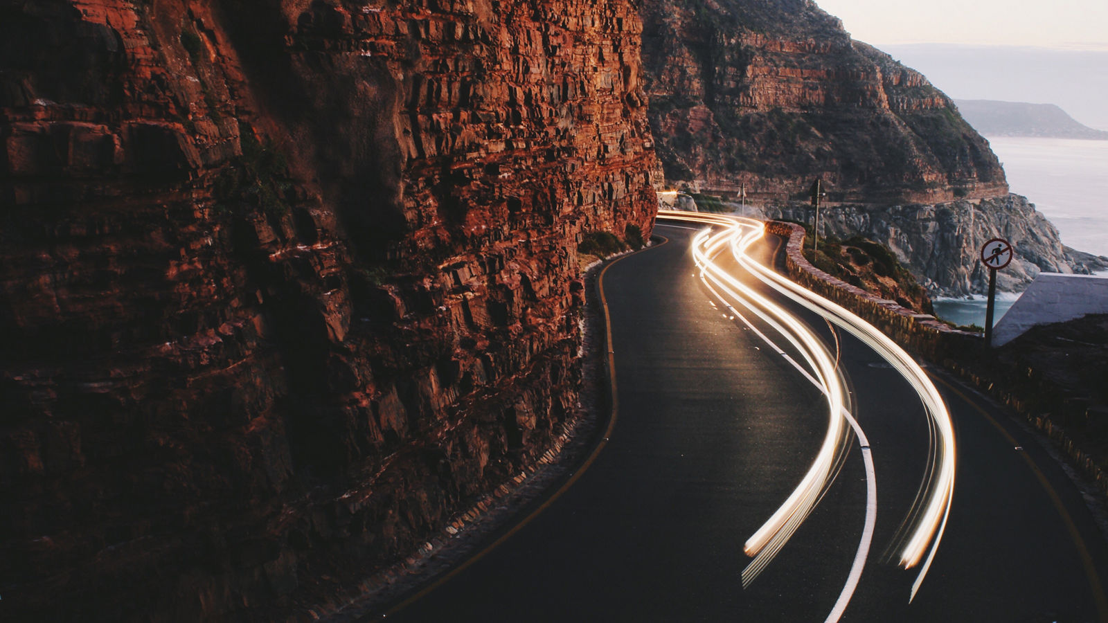 ROAD PASSING THROUGH MOUNTAINS