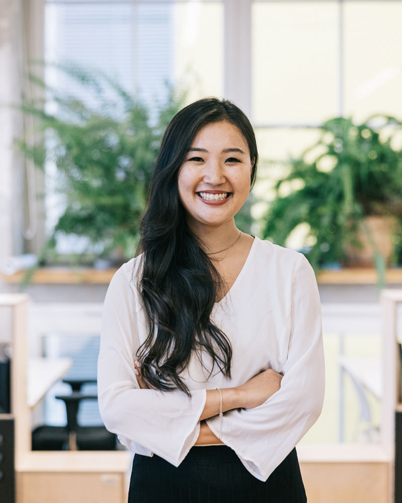 Portrait of confident woman at modern office space.