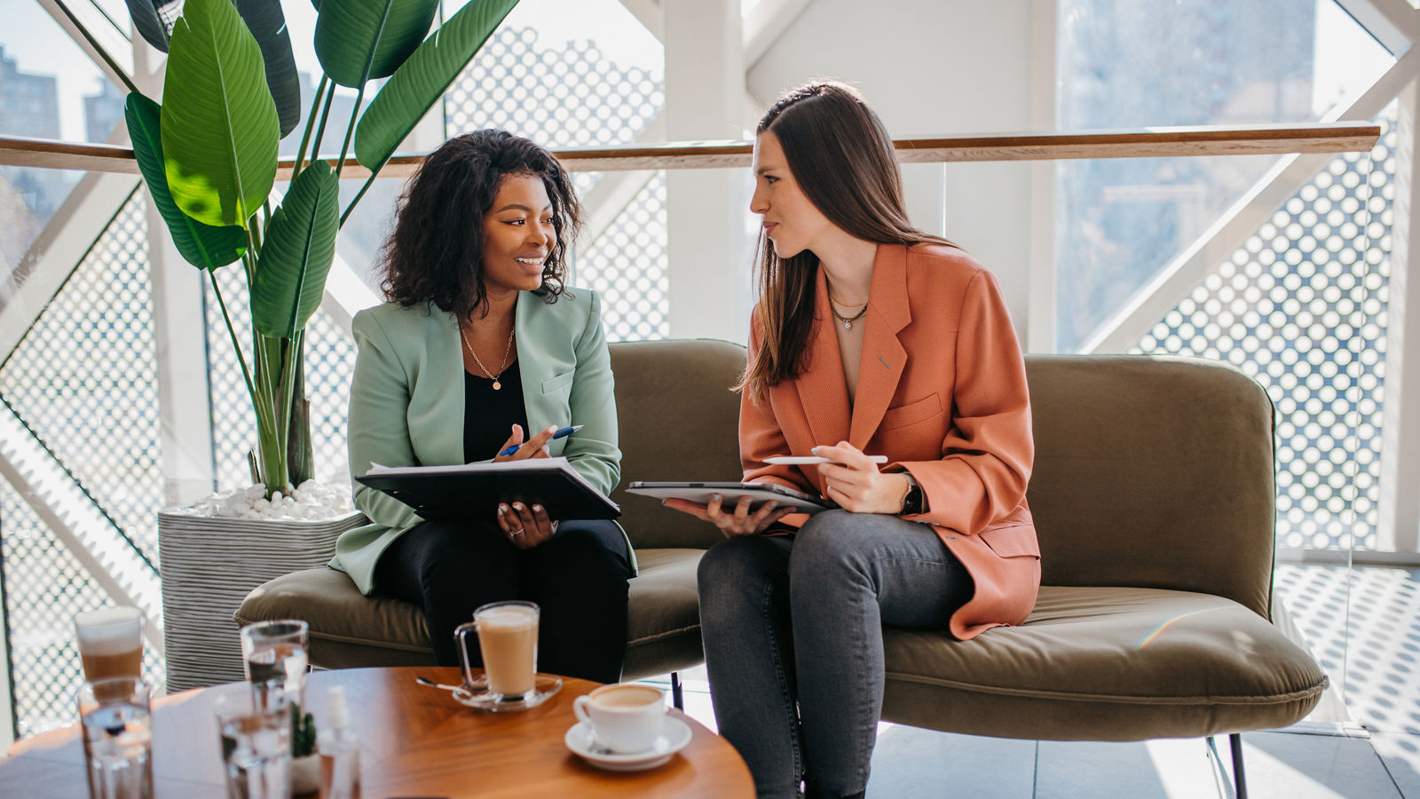 Two business women working together on a project