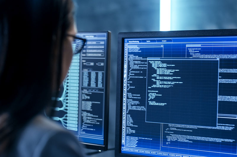 Woman working in a server room