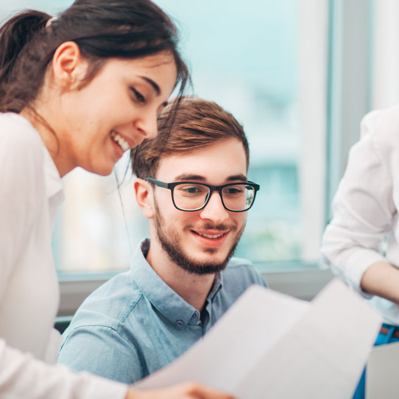 Young Intern Receives Feedback from Colleagues