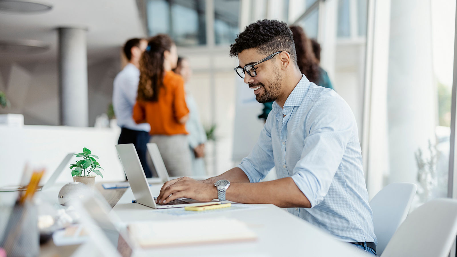 Young businessman working in office
